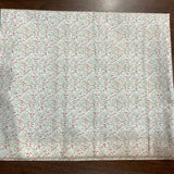 Coupon 65cm coton feuilles fond vanille (vendu tel quel)