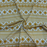 Jersey coton / elasthanne motif style astèque ocre fond crème