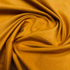 Jersey coton/élasthanne uni Jaune moutarde - 4045110