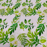 Jersey coton / élasthanne feuille teinte vert fond blanc - Exclusif